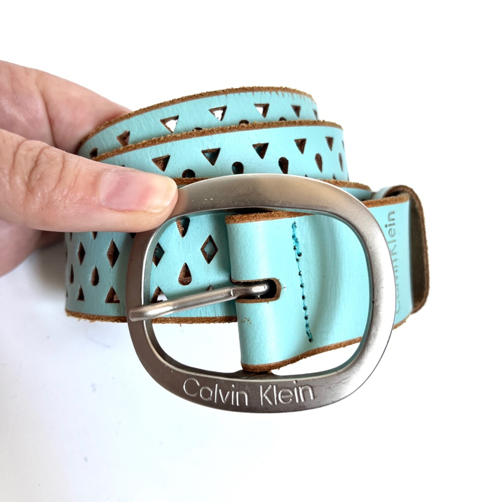 CALVIN KLEIN blue leather belt with laser-cut geometric design -